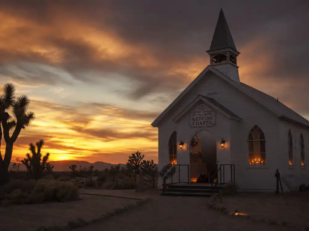 Desert wedding chapel at sunset evoking Guns N Roses November Rain era for where is Stephanie Seymour now