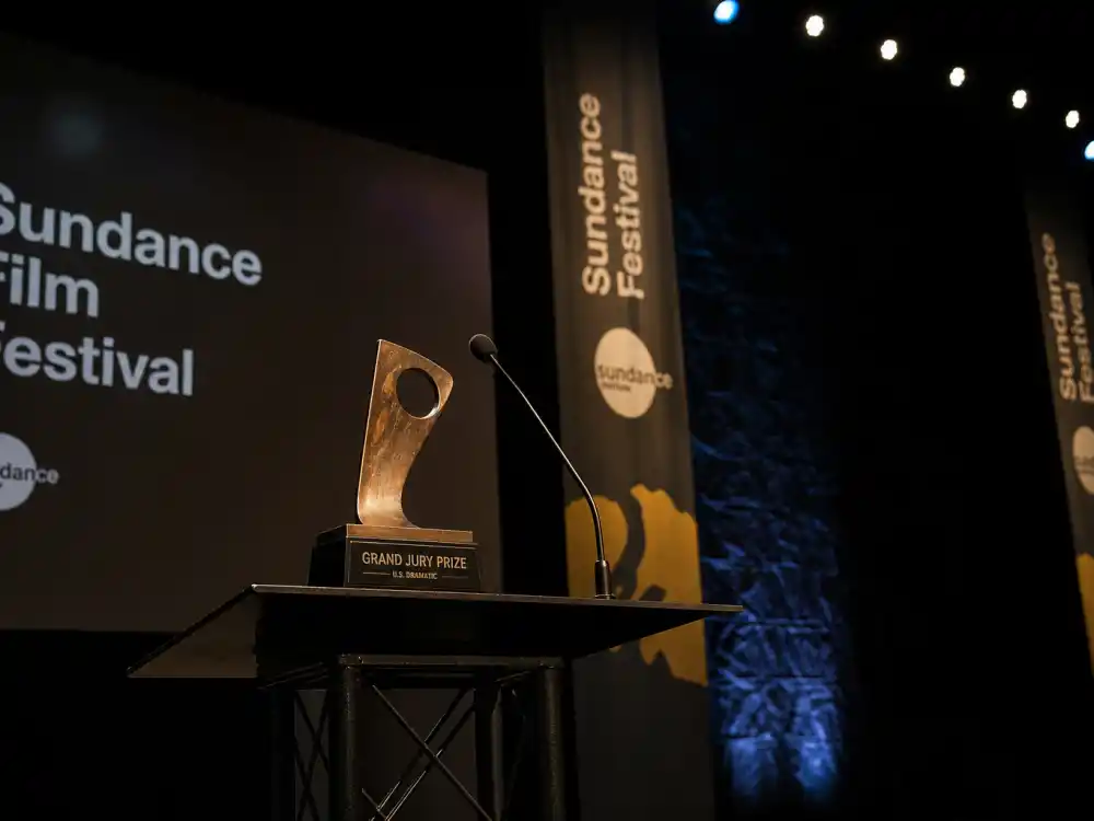 Grand jury prize trophy display symbolizing Sundance Film Festival 2026 winners across U.S. Dramatic, Documentary, and World Cinema categories