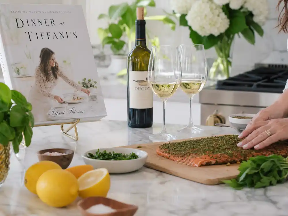 A bright celebrity kitchen with cookbook for Tiffani Thiessen cooking show host and Dinner at Tiffani's era