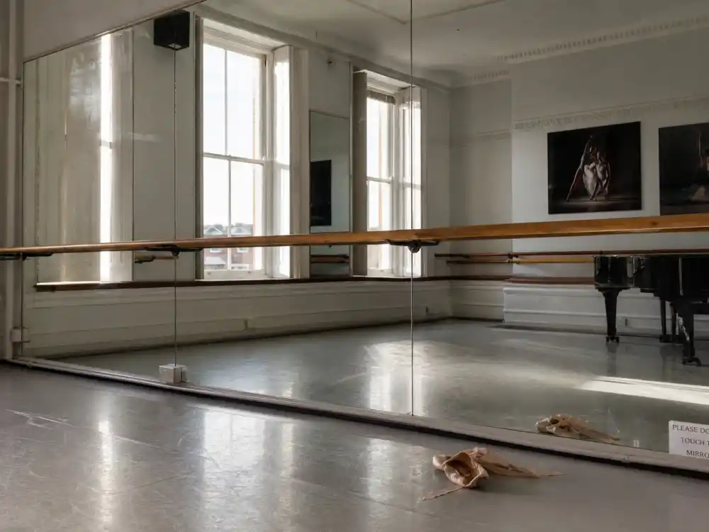 London dance studio mirrors and barre for Tom Holland lookalike siblings and family BRIT School training background People verified