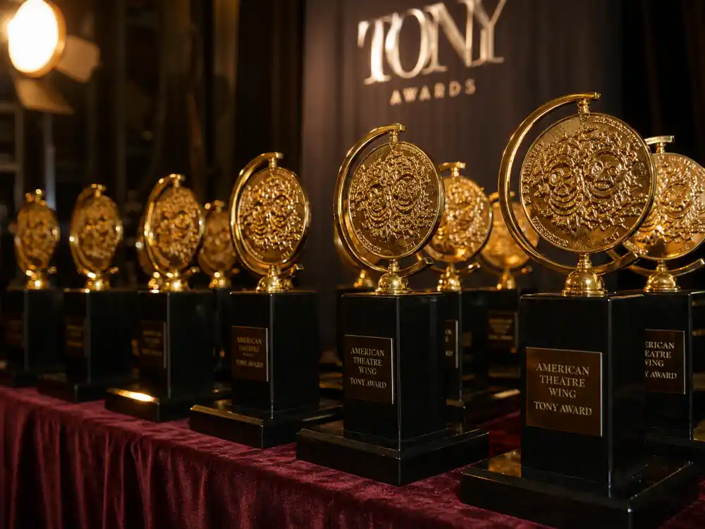 Golden Tony Award statuettes on display backstage evoke every category on the Tony Awards 2026 winners list from Best Musical to design honors