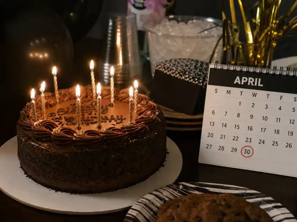 April 30 birthday cake and calendar marking Travis Scott age and birthday 2026 each year when fans celebrate his Taurus birth date