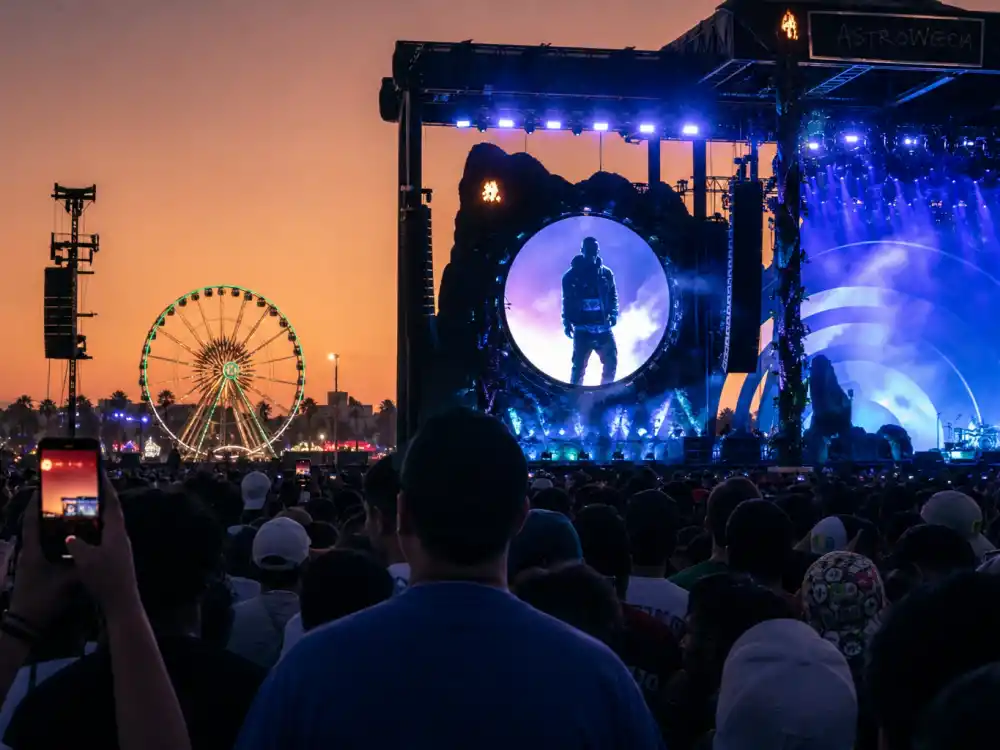 Outdoor music festival stage reflecting Travis Scott age and birthday 2026 at Astroworld era peak — chart-topping albums and arena tours in his mid-to-late twenties