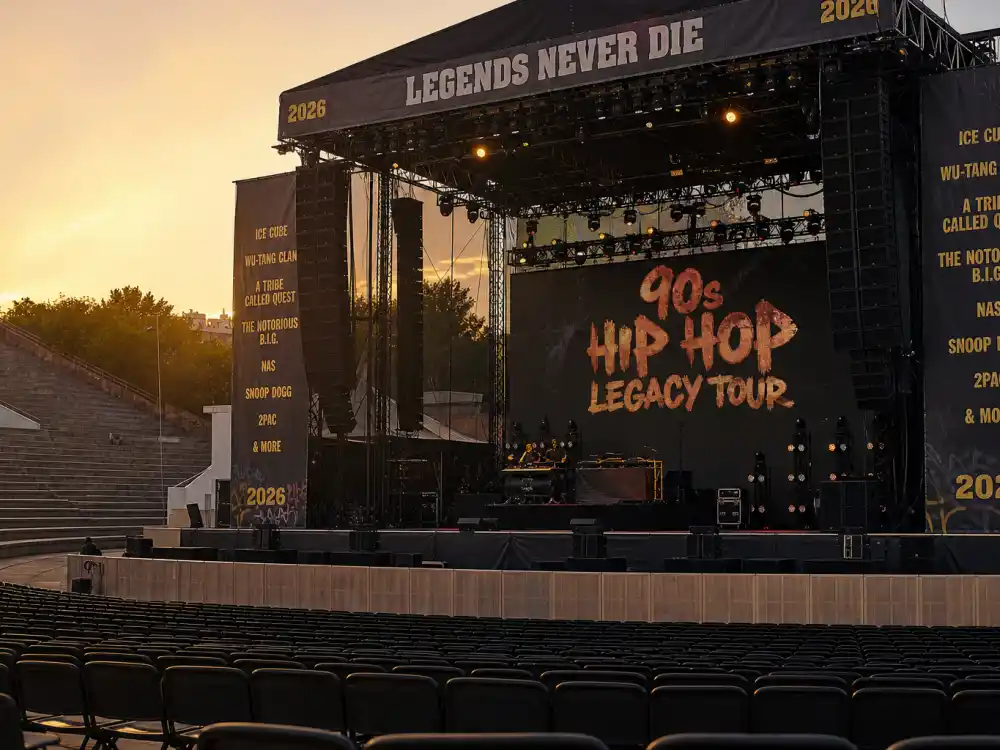 Empty amphitheater stage for what happened to Vanilla Ice now as a 90s rap legacy act in 2026