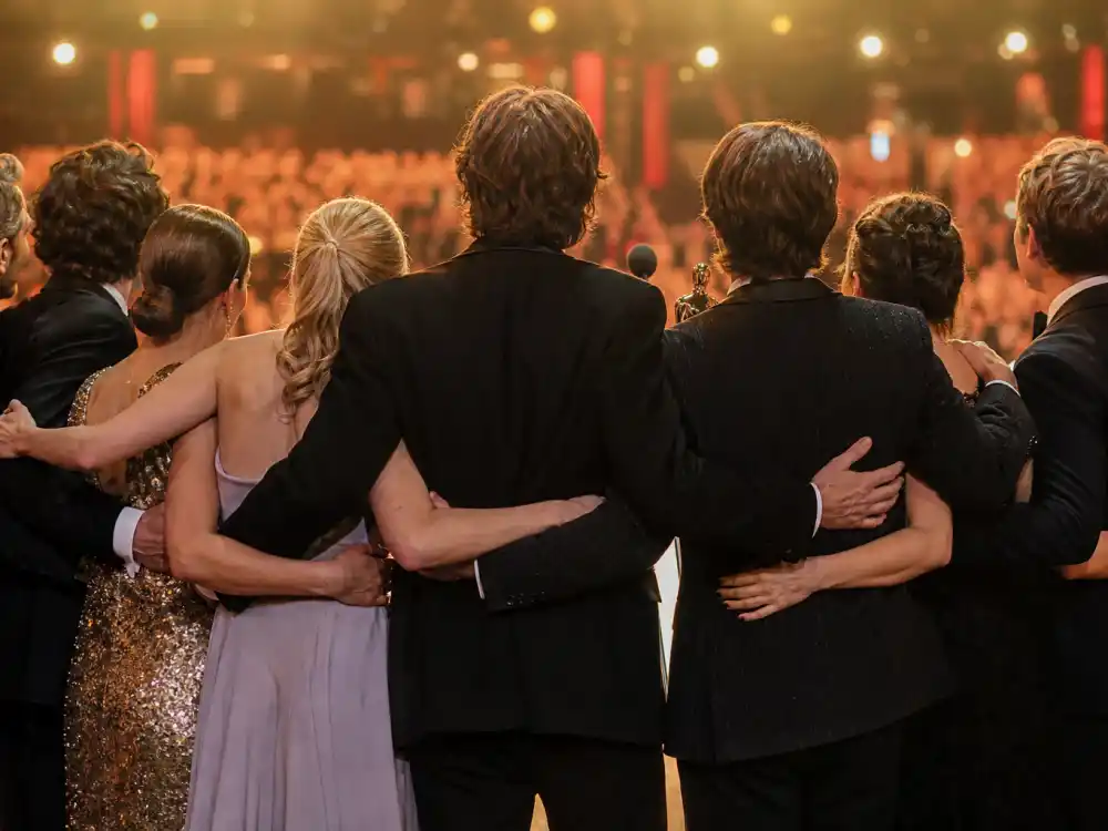 Ensemble cast lineup on awards stage for what are the SAG Awards explained — the guild signature Outstanding Performance by a Cast category