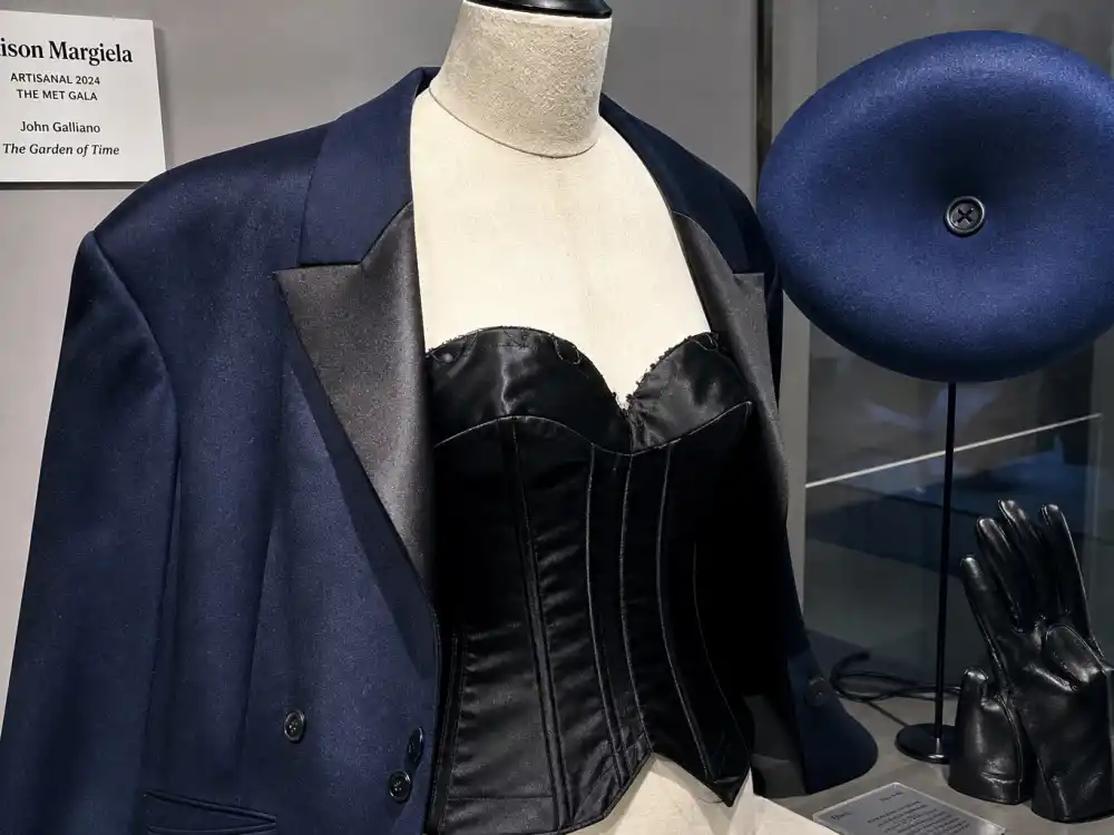 Maison Margiela smoking jacket and satin corset defining what did Bad Bunny wear to Met Gala 2024 co-host night