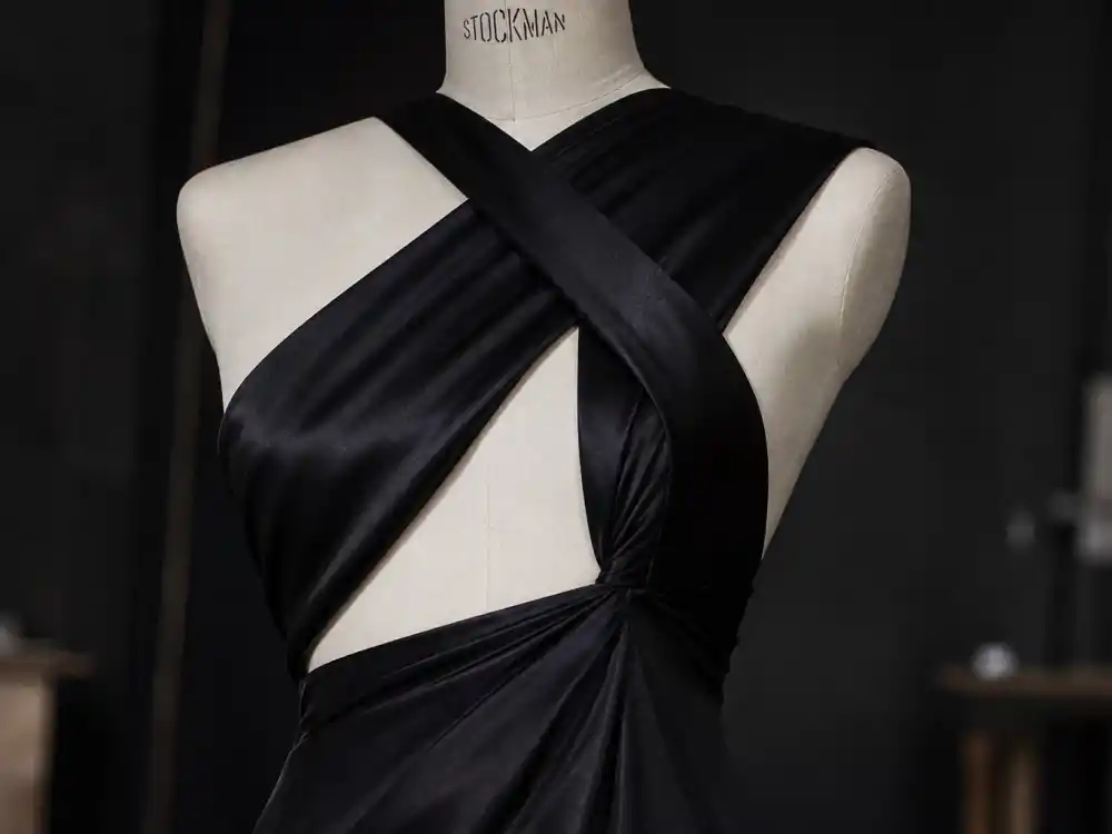 Custom Saint Laurent cross-back silk satin gown central to what did Bella Hadid wear to Cannes 2025 opening ceremony