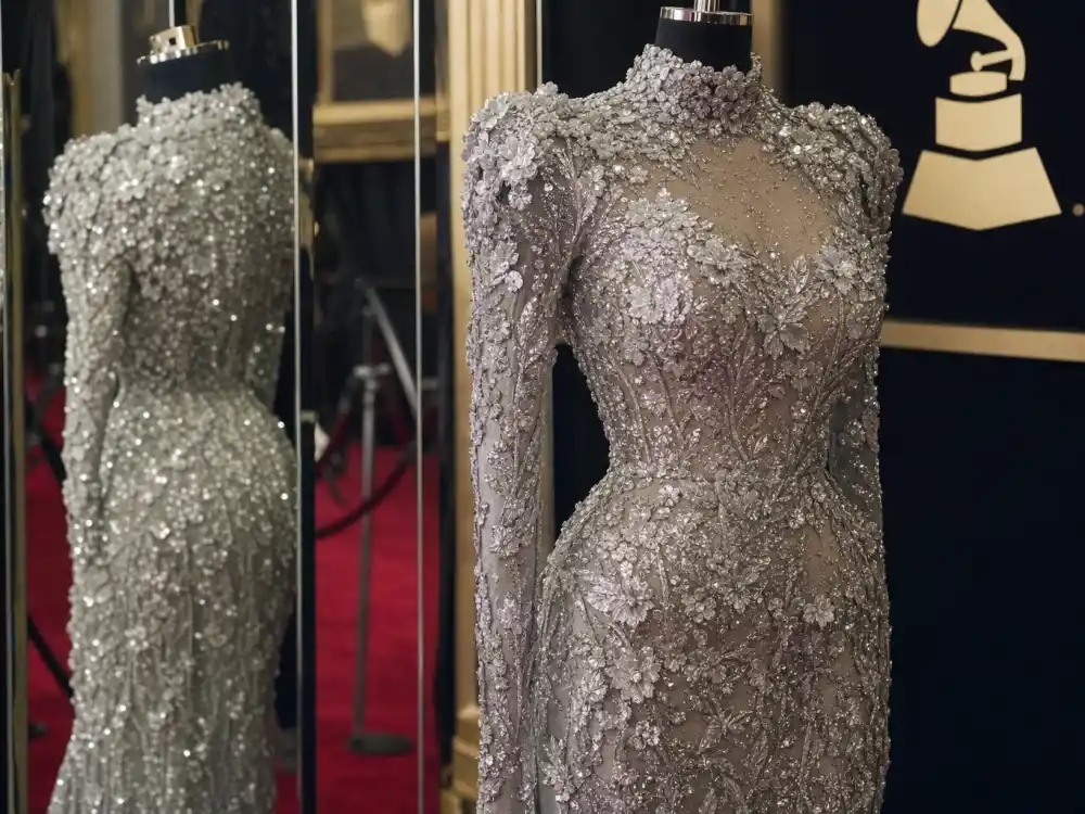 Silver floral Balmain sequin couture reflecting what did Beyonce wear to Grammy Awards 2024 red carpet moment