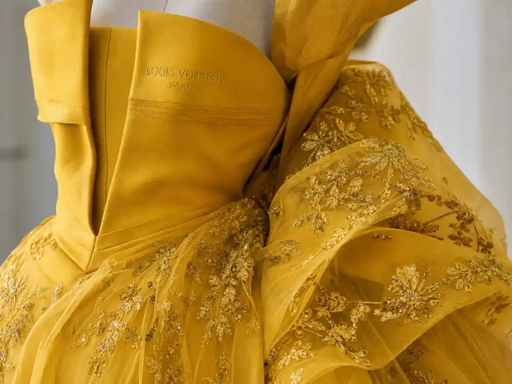 Louis Vuitton bright yellow Oscar couture central to what did Emma Stone wear to Oscars ambassador era
