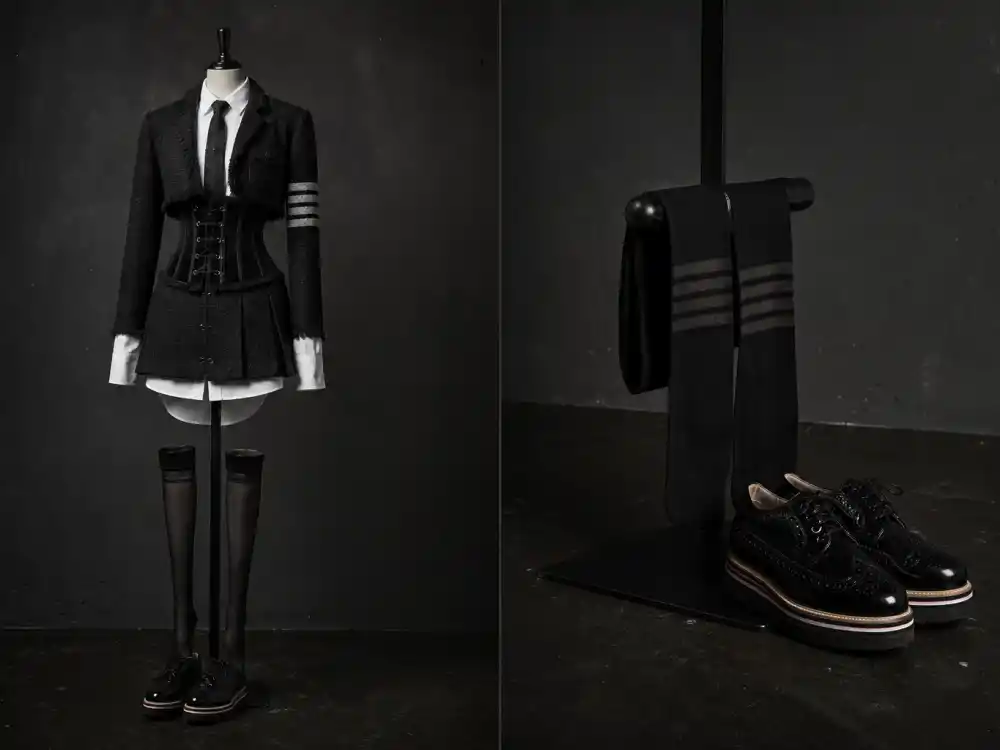 Gothic black and white tailoring with corset lacing and platform brogues shaping what did Jenna Ortega wear to Met Gala aesthetic codes