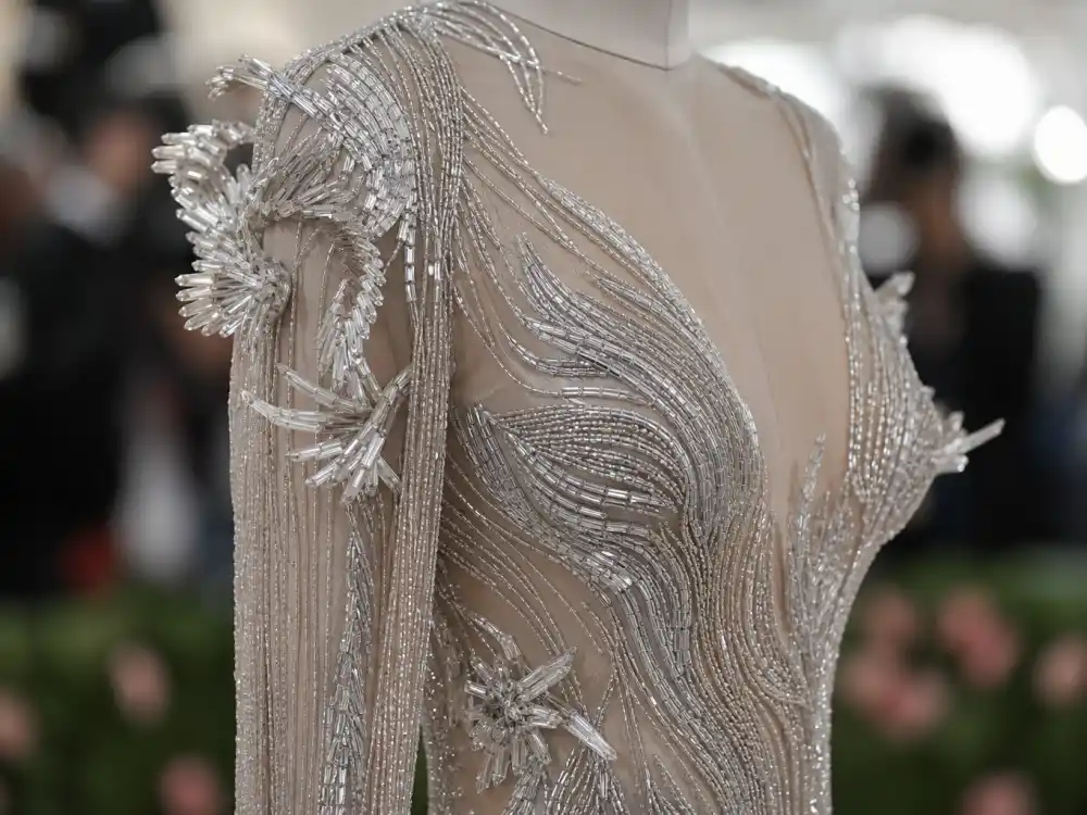 Schiaparelli silver bugle bead embroidery central to what did Jennifer Lopez wear to Met Gala 2024 co-chair couture