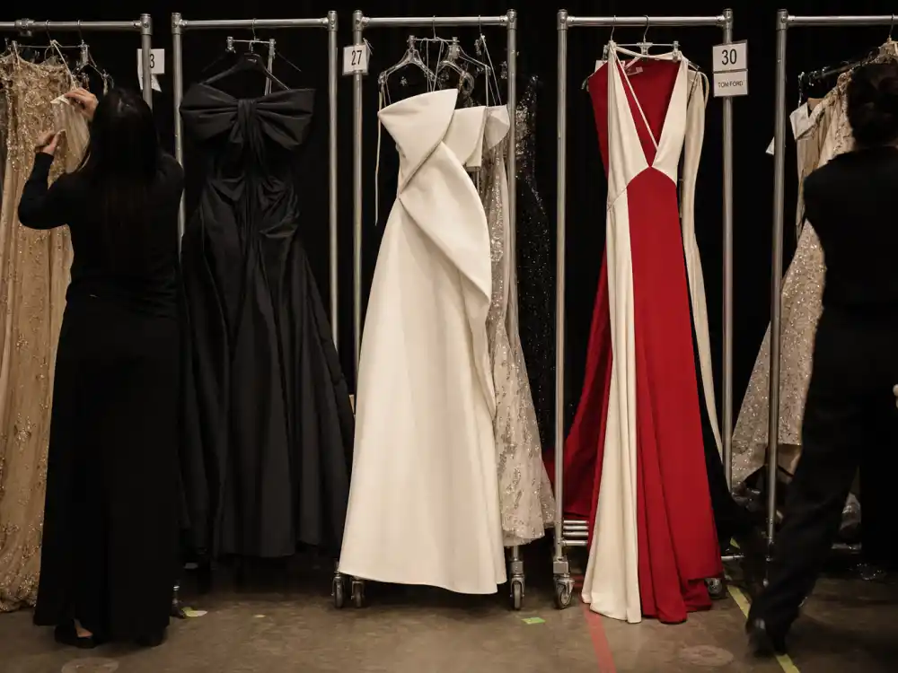 Row of dramatic Oscar evening gowns illustrating what did Lady Gaga wear to Oscars over the years