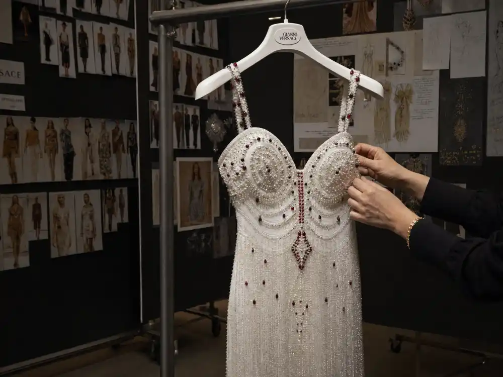 Vintage Versace beaded white gown defining what did Olivia Rodrigo wear to Grammys 2024 archive glamour pivot