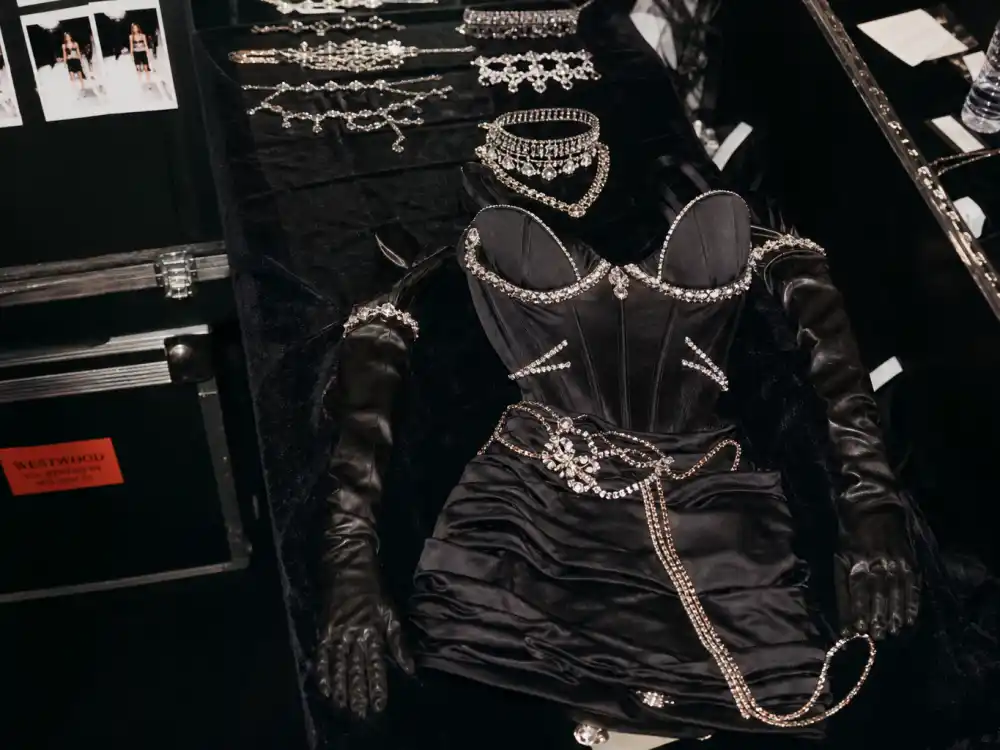 Vivienne Westwood corseted mini with opera gloves shaping what did Olivia Rodrigo wear to Grammys 2022 debut