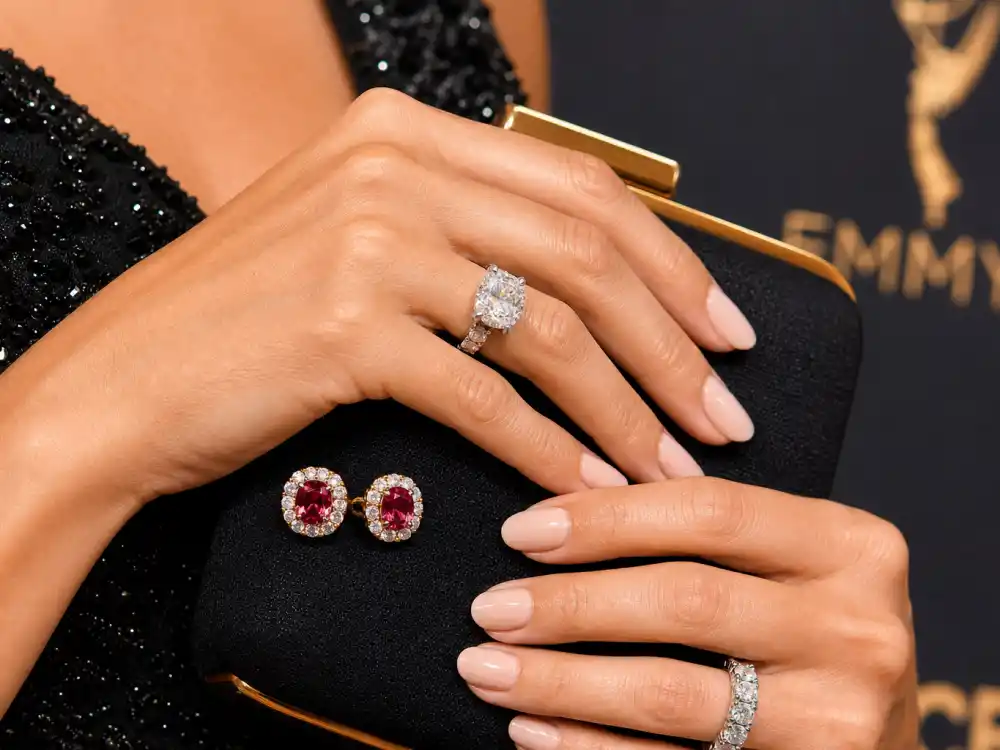 Tiffany and Co diamond ruby earrings and rings shaping what did Selena Gomez wear to Emmys jewelry styling across ceremonies