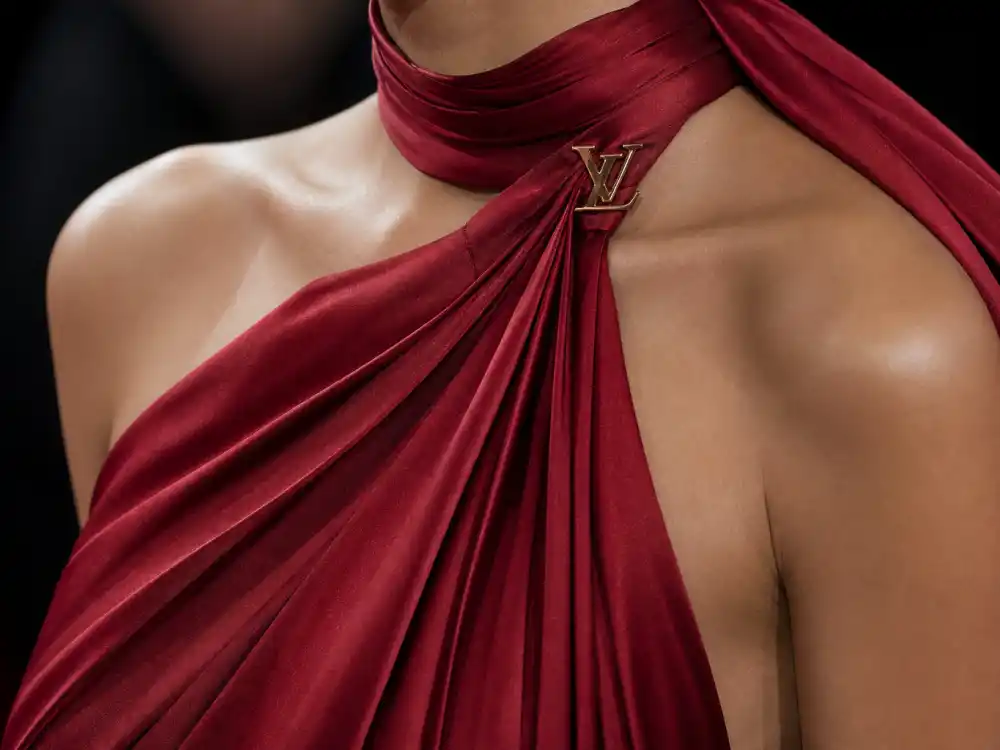 Louis Vuitton cherry-red halter scarf neckline detail central to what did Selena Gomez wear to Emmys 2025 couture choice