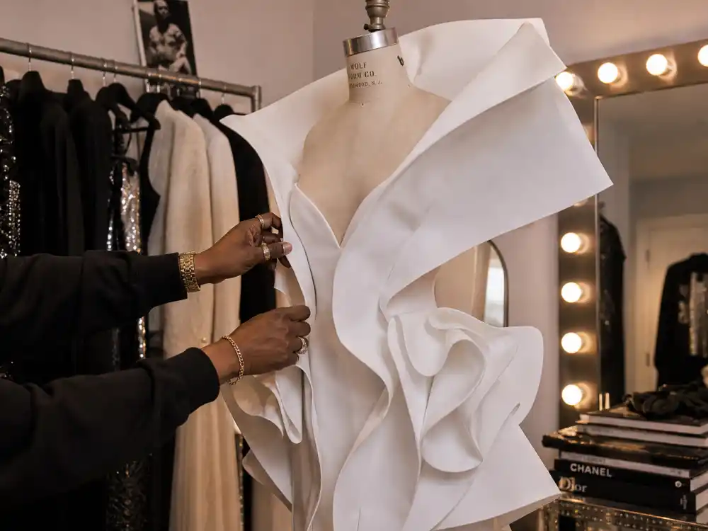 Law Roach styling a sculptural white couture dress for what did Zendaya wear to Met Gala red carpet moments