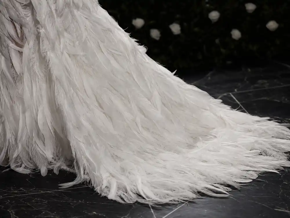 Dramatic white feathered couture train reflecting what did Zendaya wear to Met Gala avant-garde aesthetic