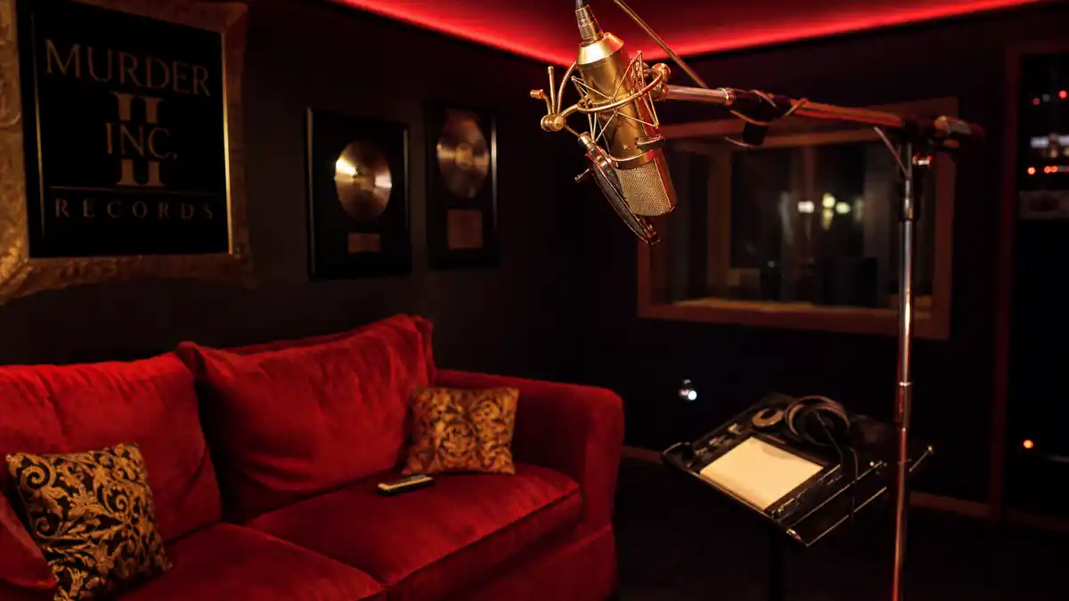 What happened to Ja Rule — early 2000s hip-hop studio with gold microphone evoking Murder Inc era fame