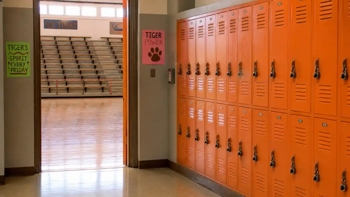 What happened to Mark-Paul Gosselaar — a sunny 1990s high school hallway evoking Saved by the Bell and Zack Morris fame