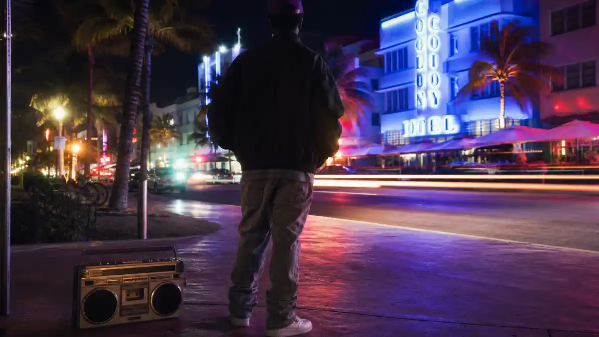 What happened to Vanilla Ice — 1990s Miami night street with boombox evoking Ice Ice Baby 90s rap era