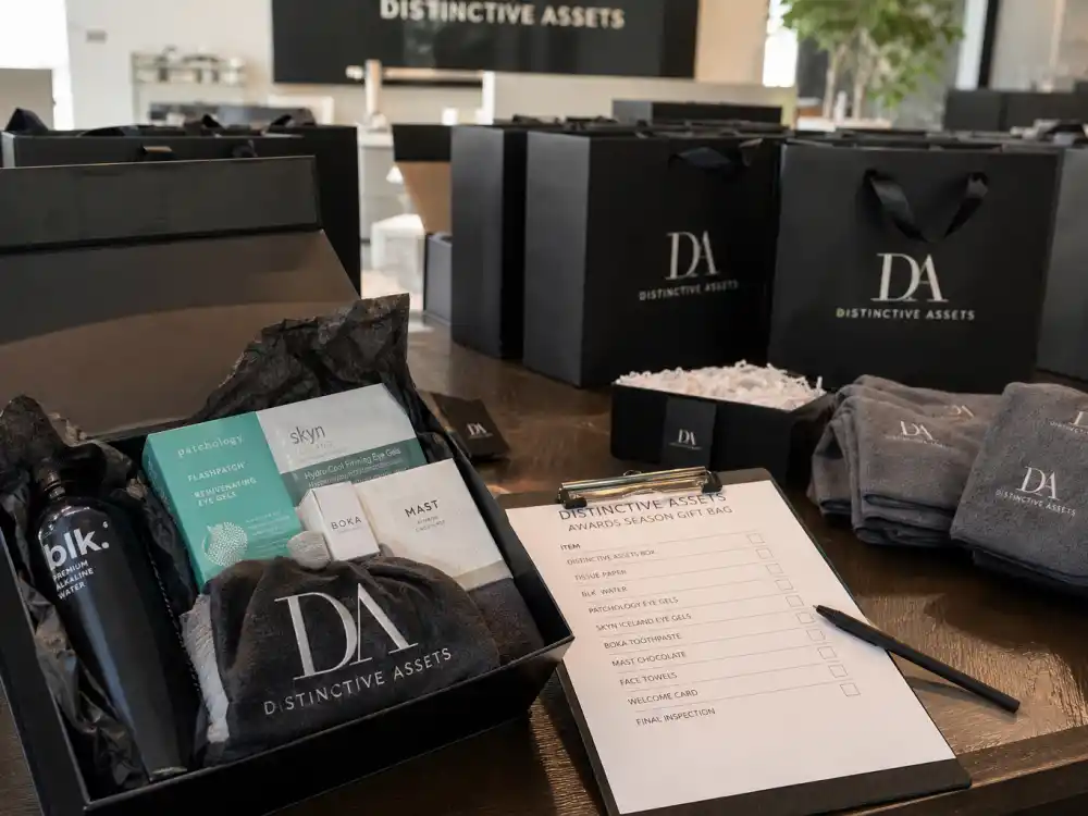 Distinctive Assets marketing studio assembling award show gift bags — what is in award show gift bags for Oscar nominees starts with the Everyone Wins program since 2002