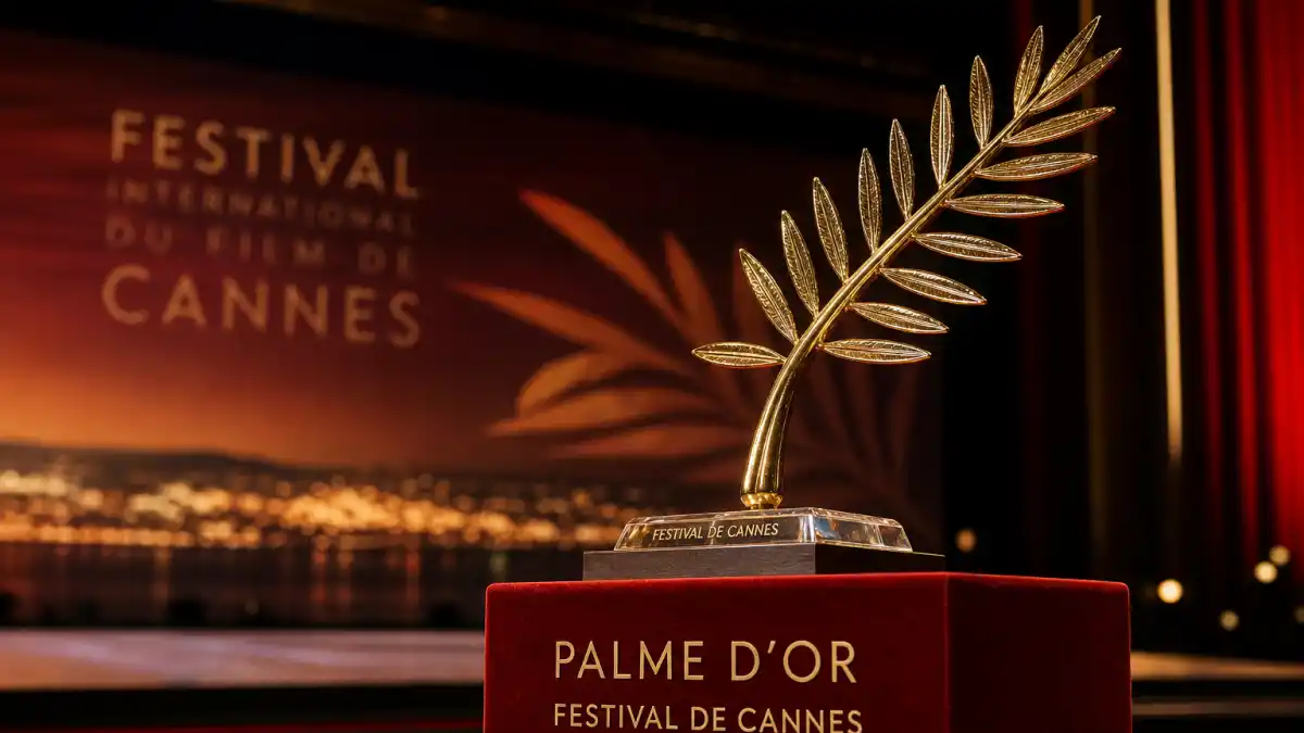 What is the Palme d'Or and why it matters — golden Palme d'Or trophy on Cannes Film Festival awards ceremony stage