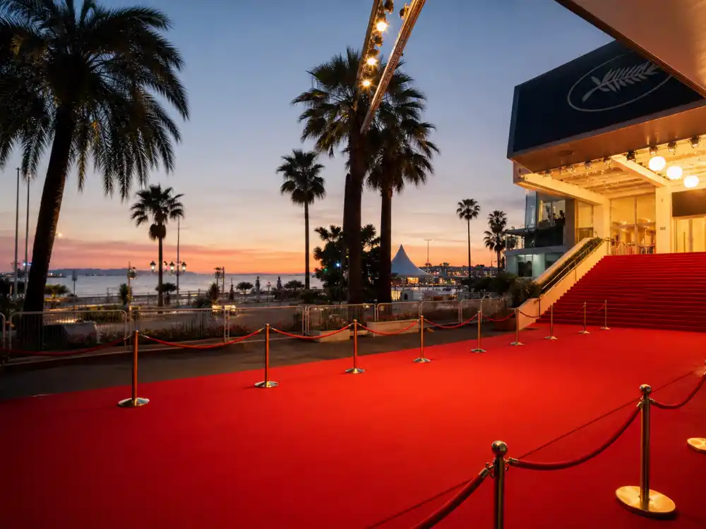 Cannes Croisette red carpet at dusk tied to what is the Palme d'Or and why it matters festival prestige