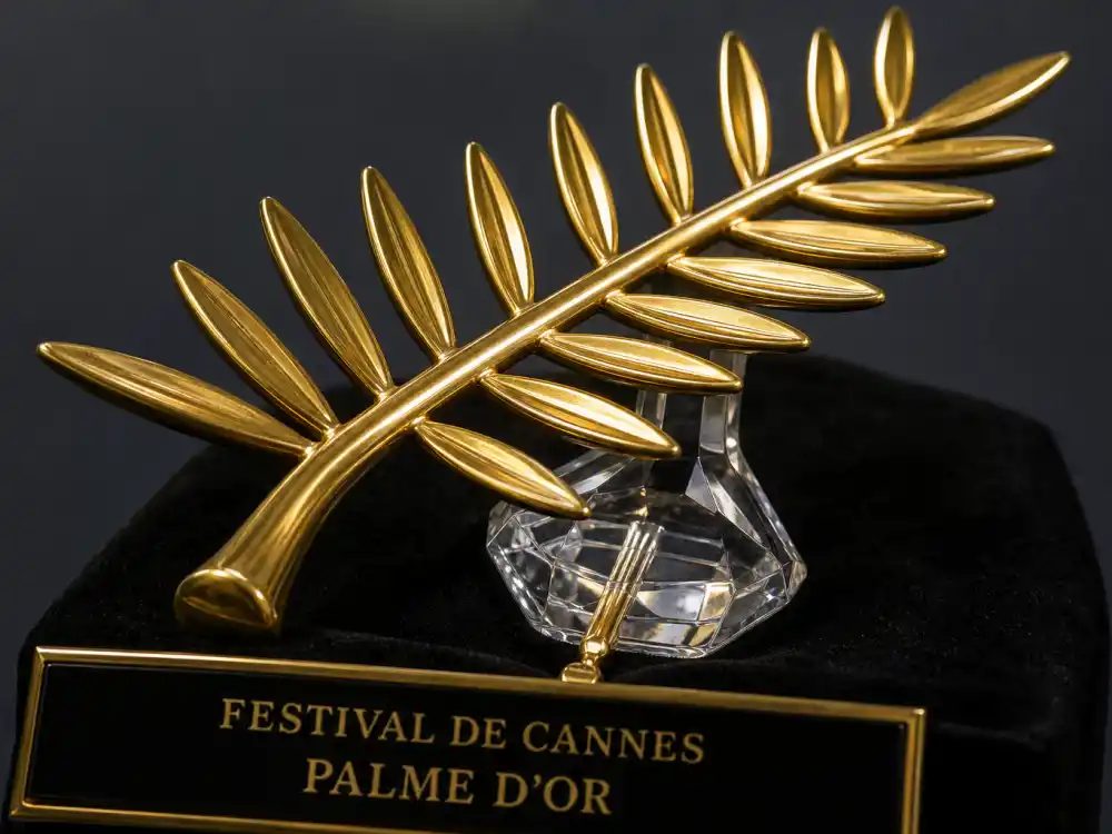 Golden Palme d'Or palm-leaf trophy design detail for what is the Palme d'Or and why it matters explainer