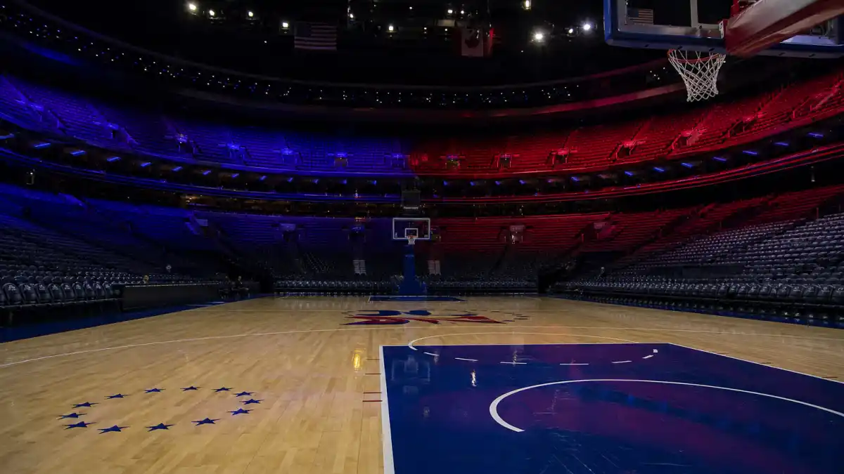 Where is Allen Iverson now — empty NBA arena at night evoking Philadelphia 76ers legend era