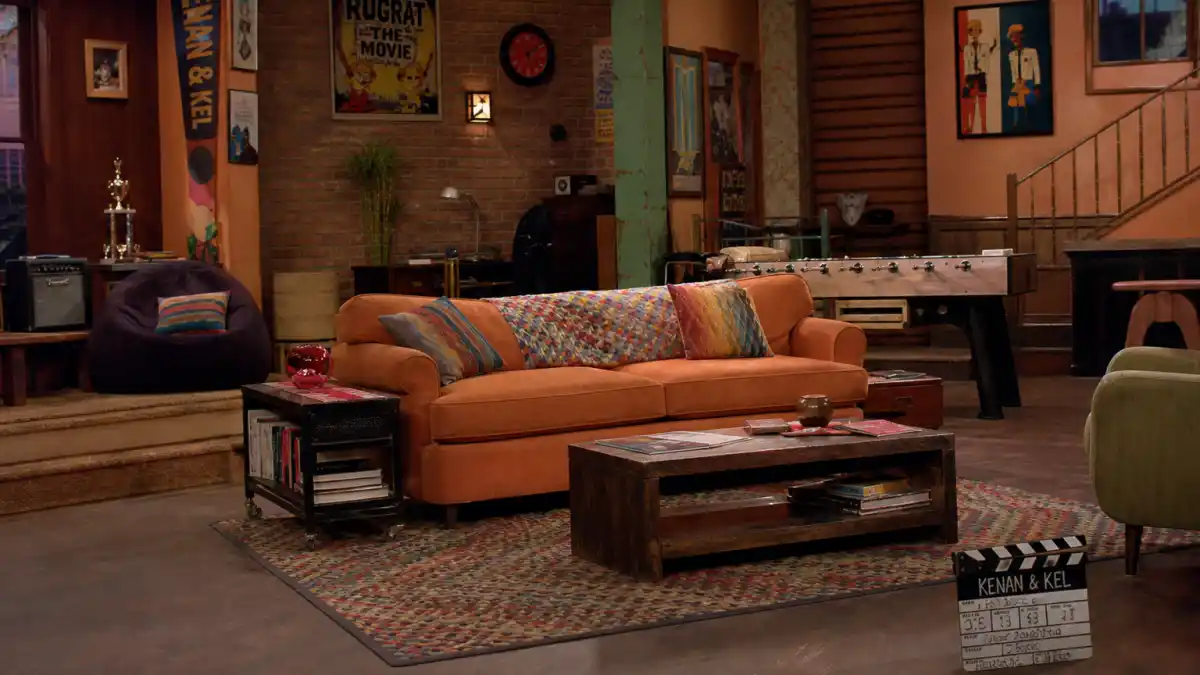 Where is Kel Mitchell now — 1990s orange-couch TV sitcom studio set evoking Kenan and Kel Nickelodeon fame