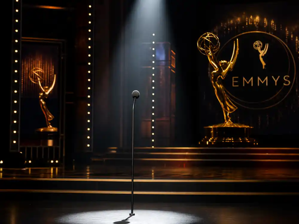Awards ceremony monologue podium where who is hosting the Emmys 2026 will deliver opening jokes at the 78th Primetime Emmy Awards telecast