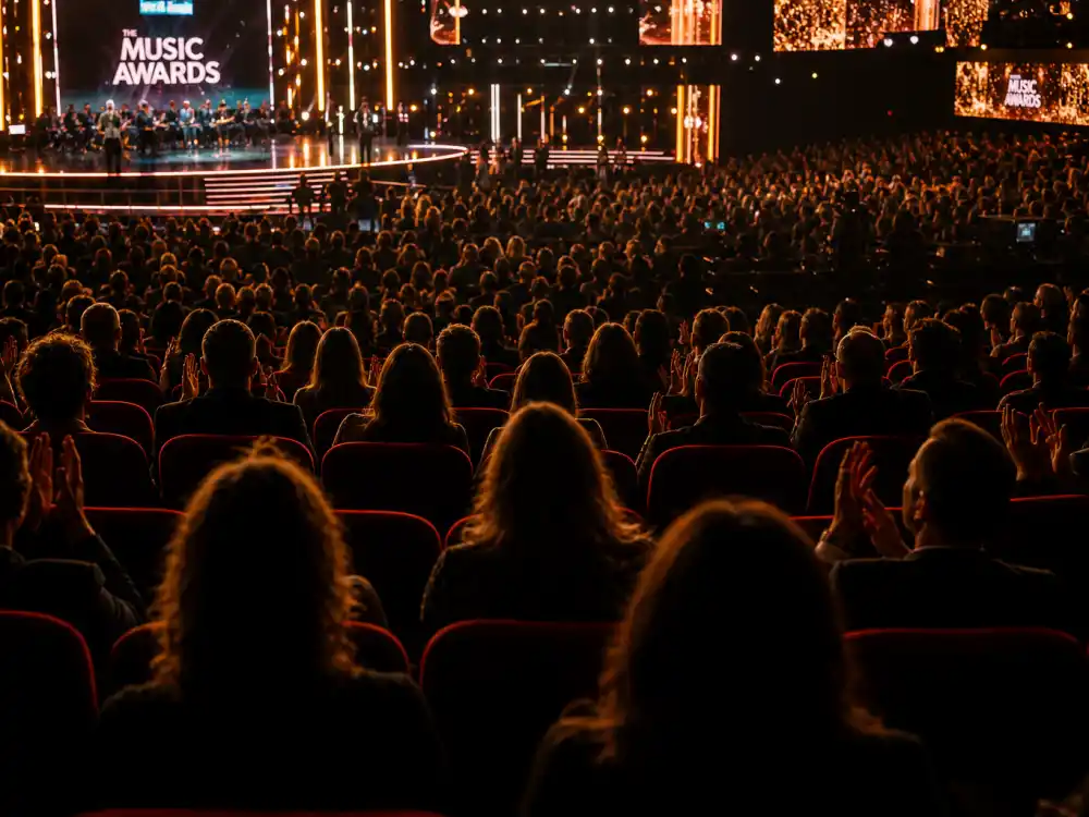 Theatre audience watching the 68th Grammy Awards as viewers searched who is hosting the Grammys 2026 on ceremony night Feb. 1