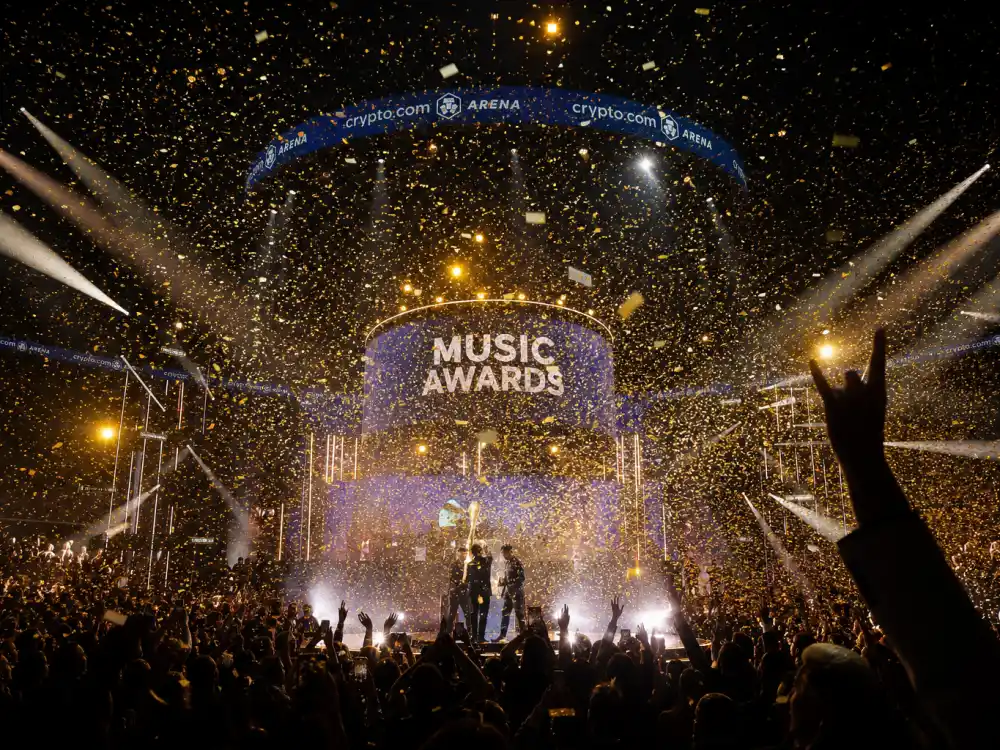 Arena stage with golden confetti after who won album of the year Grammys 2026 was announced at Crypto.com Arena