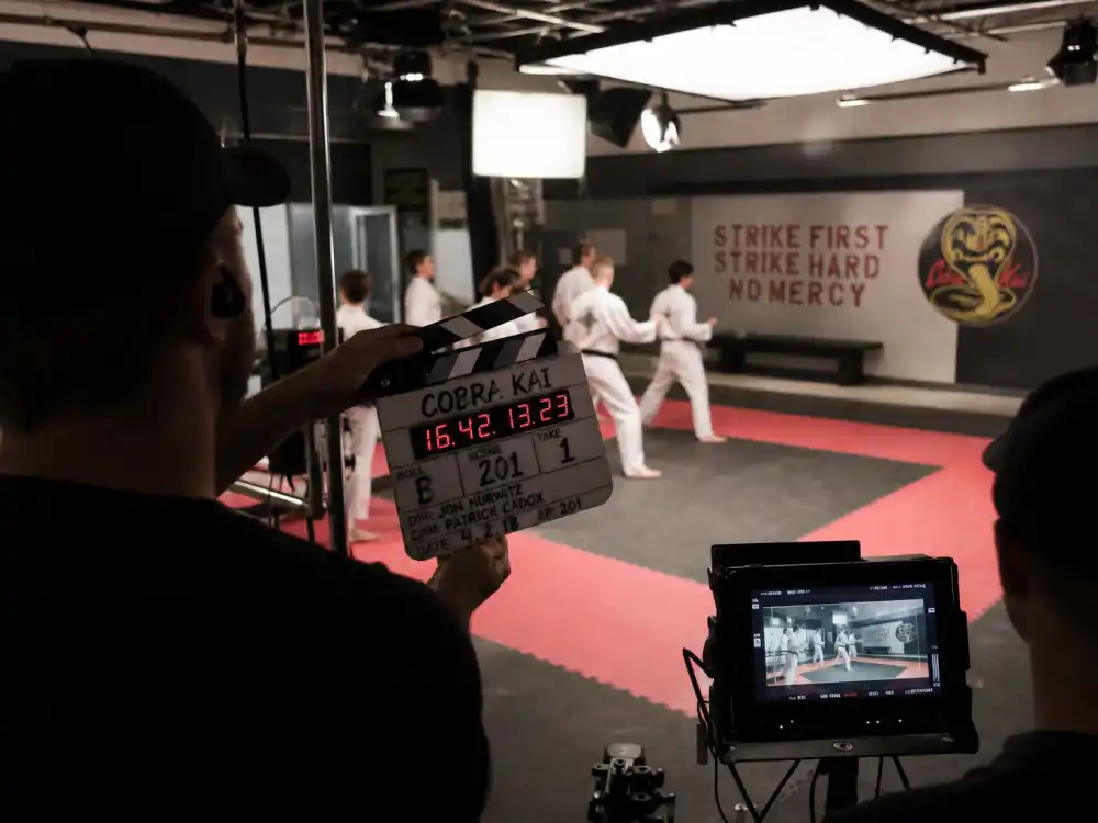A Cobra Kai television production set with karate mats for William Zabka streaming revival comeback