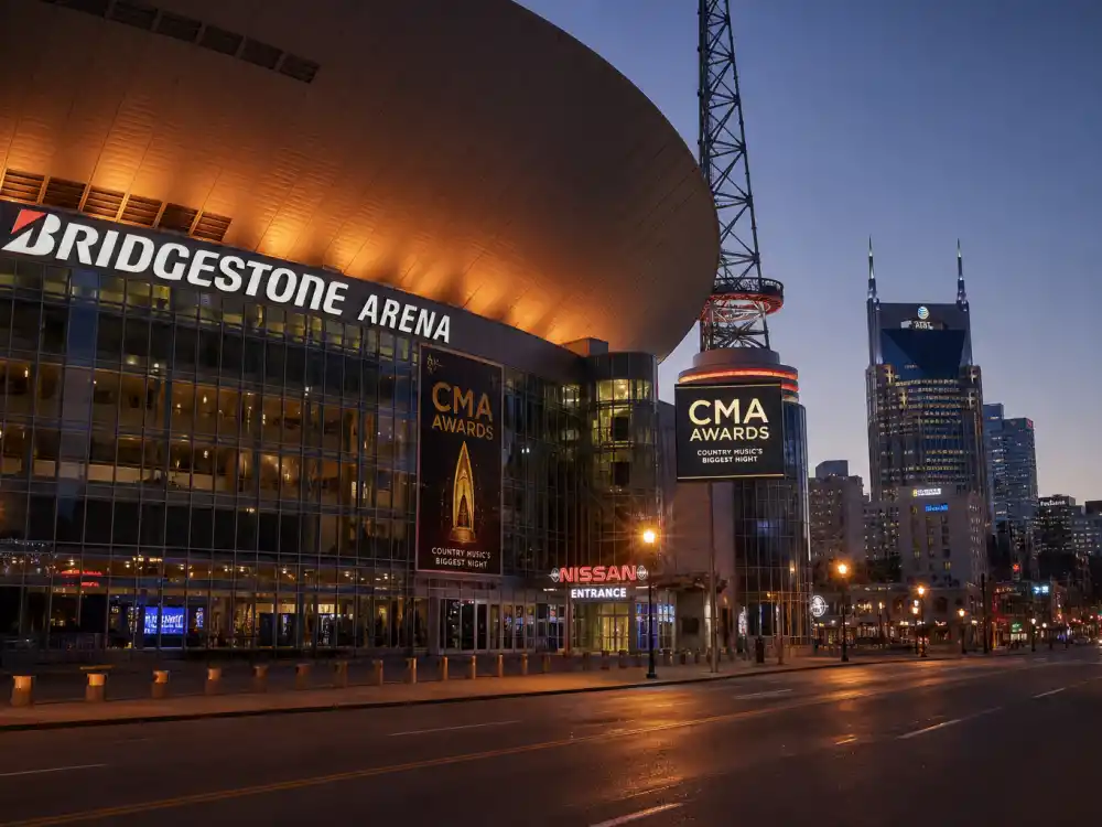 Bridgestone Arena Nashville exterior at dusk where youngest CMA Entertainer of the Year winners accept country music highest honor each November