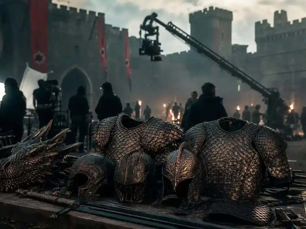 Best new streaming shows July 2026 ranked House of the Dragon — fantasy TV drama crew on medieval castle film set with dragon-scale props and camera crane