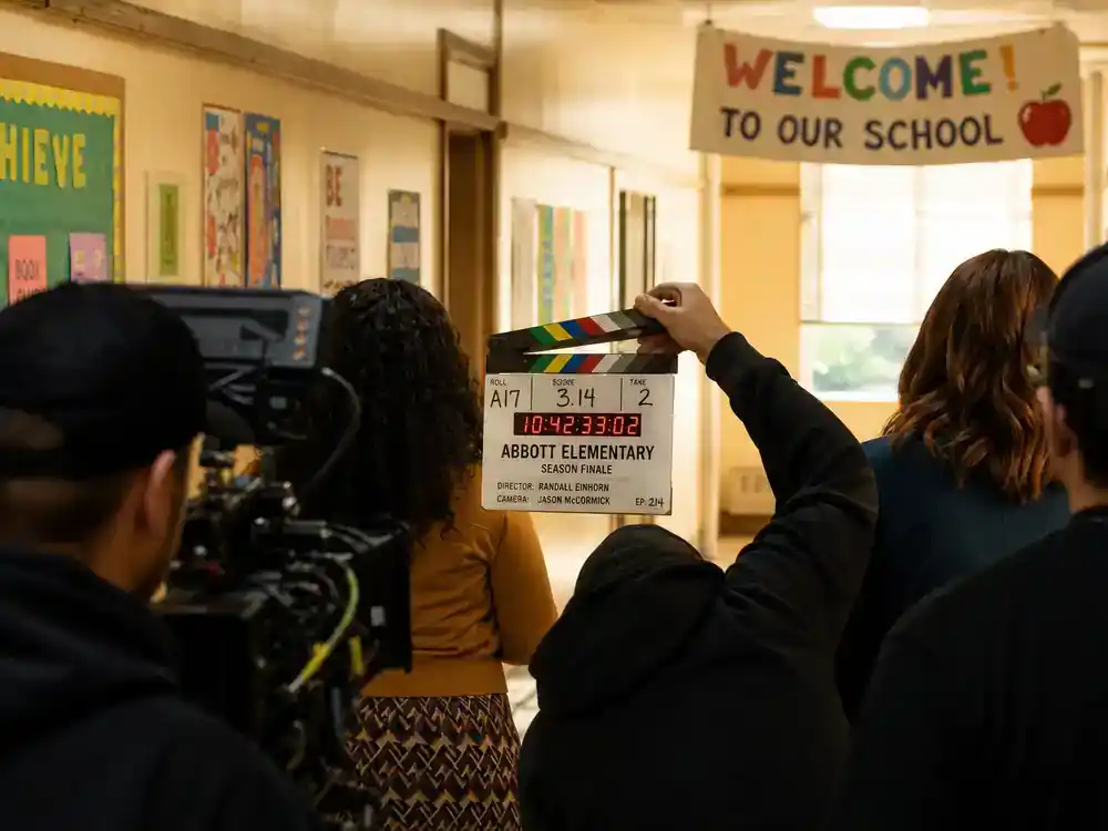 Best TV finales of 2026 ranked so far Abbott Elementary — mockumentary TV comedy elementary school hallway filming with clapperboard and teacher silhouettes