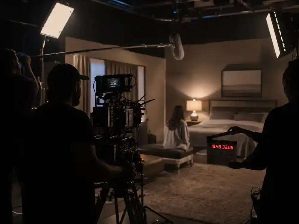 Euphoria season 3 cast and release updates filming — premium TV drama soundstage with camera boom LED panels and crew adjusting bedroom set lighting