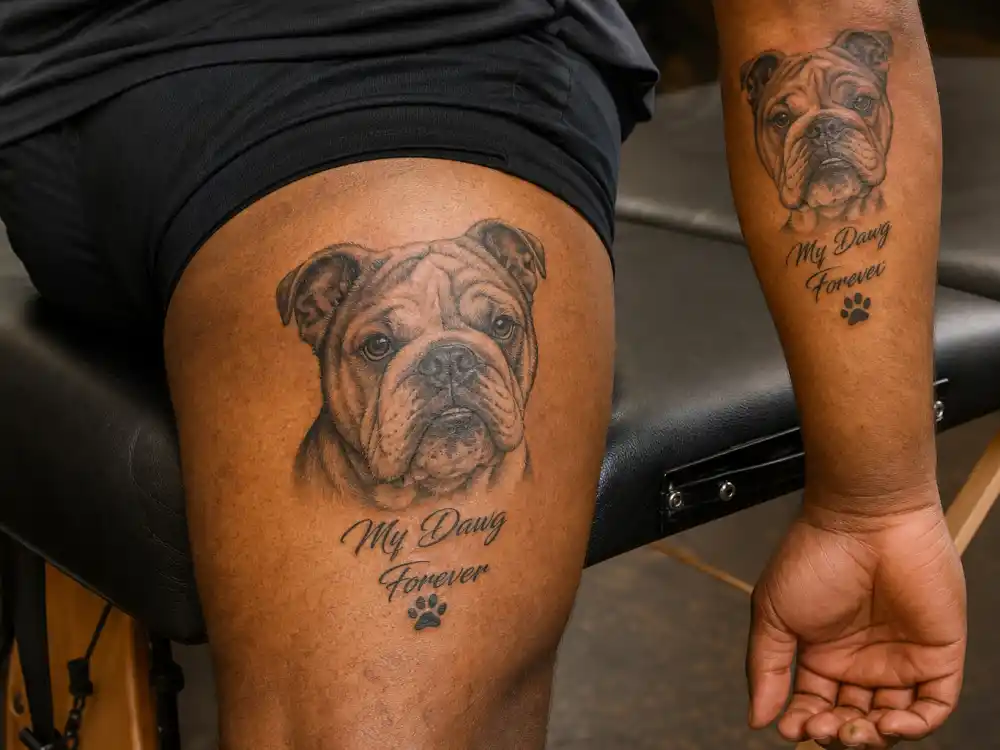 Kid Cudi tattoos and their meanings — memorial bulldog portrait tattoos on hand and thigh tribute to late dog Freshie