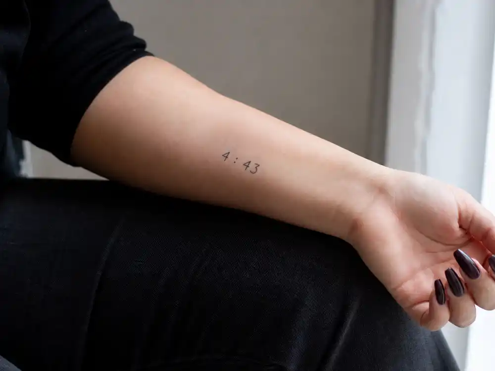 Kylie Jenner tattoos and their meanings — 4:43 forearm timestamp tattoo marking Stormi Webster birth time per People and ET