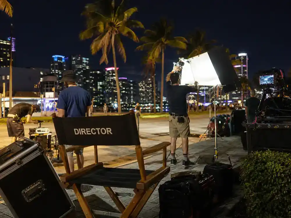 Netflix movies coming in July 2026 72 Hours — Miami comedy film set at night with director chair and crew lighting street scene