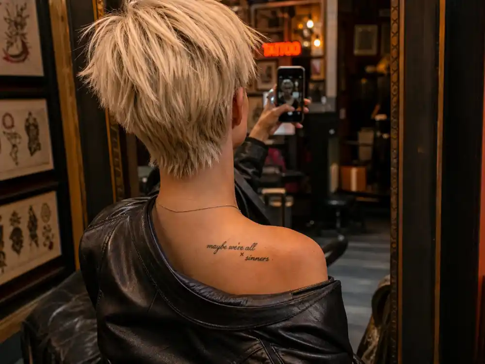 Ruby Rose tattoos and their meanings Maybelline — Maybe shes born with it chest script tattoo from Maybelline campaign tribute