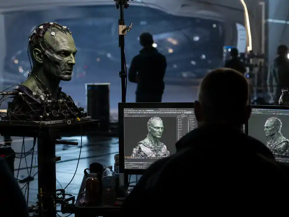 Superman 2026 movie cast and characters guide Brainiac — sci-fi villain effects rehearsal with prosthetics and VFX monitors on blockbuster film set