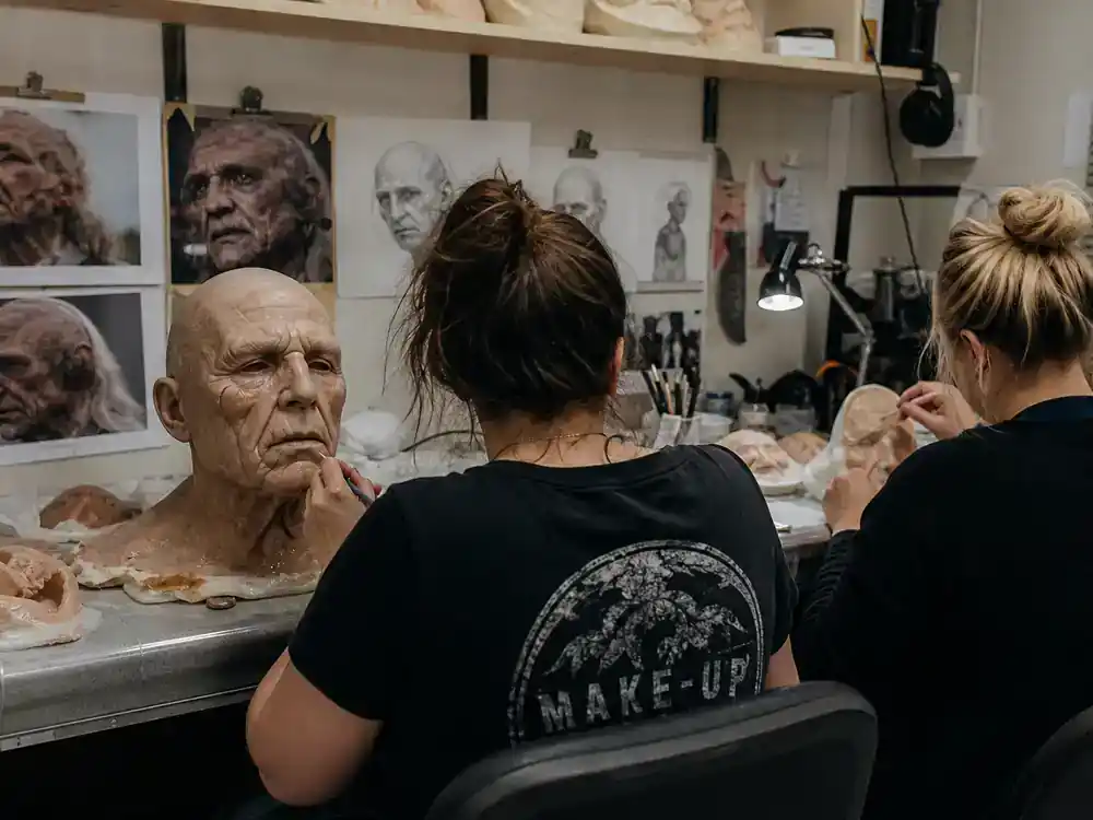The Last of Us behind the scenes filming facts prosthetics — SFX artists from behind crafting textured facial appliances in makeup workshop trailer