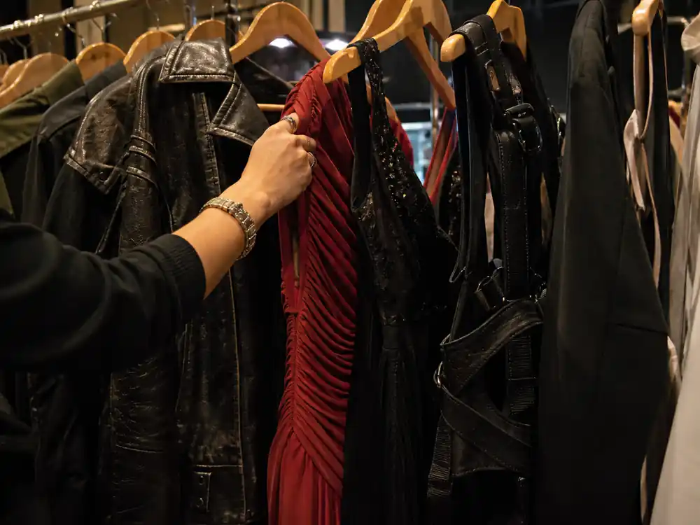 Film wardrobe rack with modern-era garments in Angelina Jolie net worth over the years