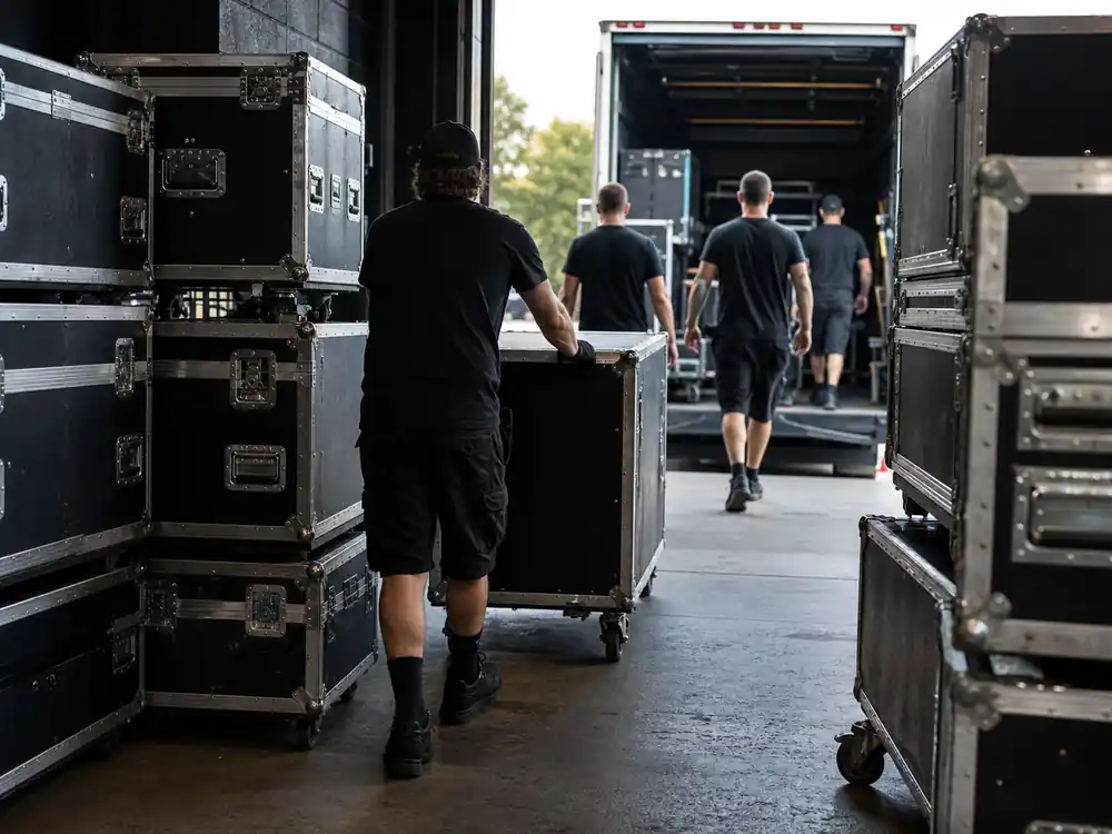 Tour road cases on a loading dock tied to Beyonce net worth 2026
