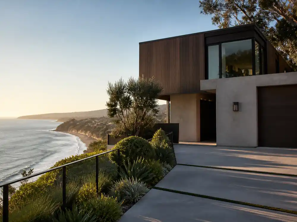 Malibu cliff house exterior at golden hour tied to Brad Pitt net worth over the years property chapter