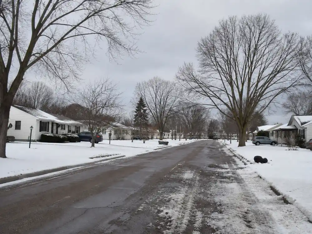 Humble Michigan suburban street in winter for Eminem net worth 2026 origins