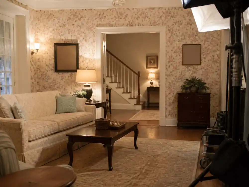 Empty floral living room film set tied to richest actors in Hollywood 2026 franchise library wealth